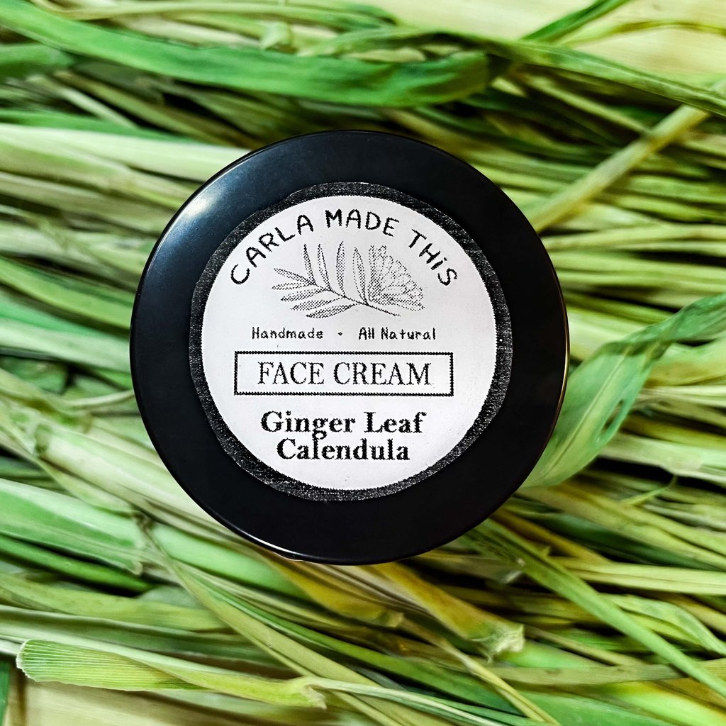 Round tin of ginger leaf calendula face cream