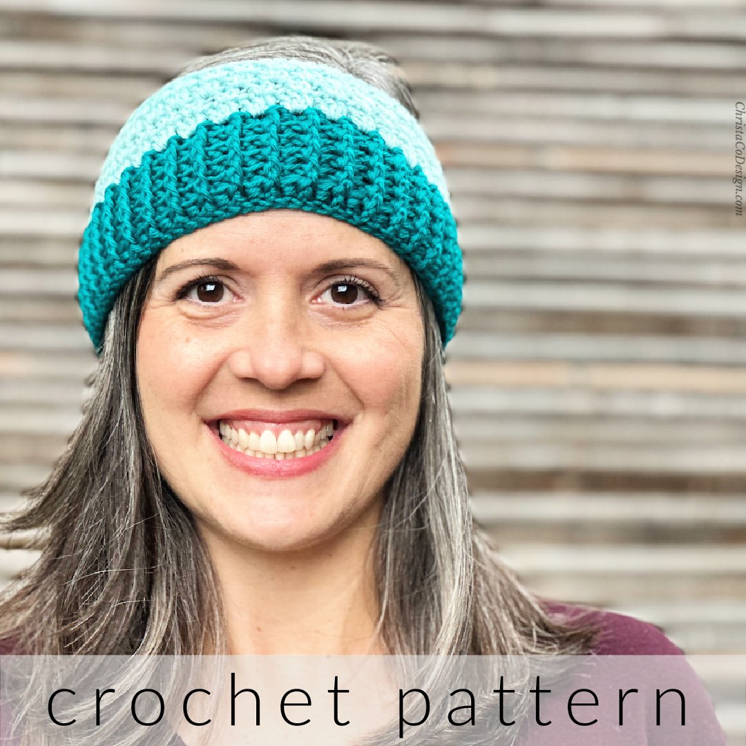 Woman in blue crochet ear warmer.