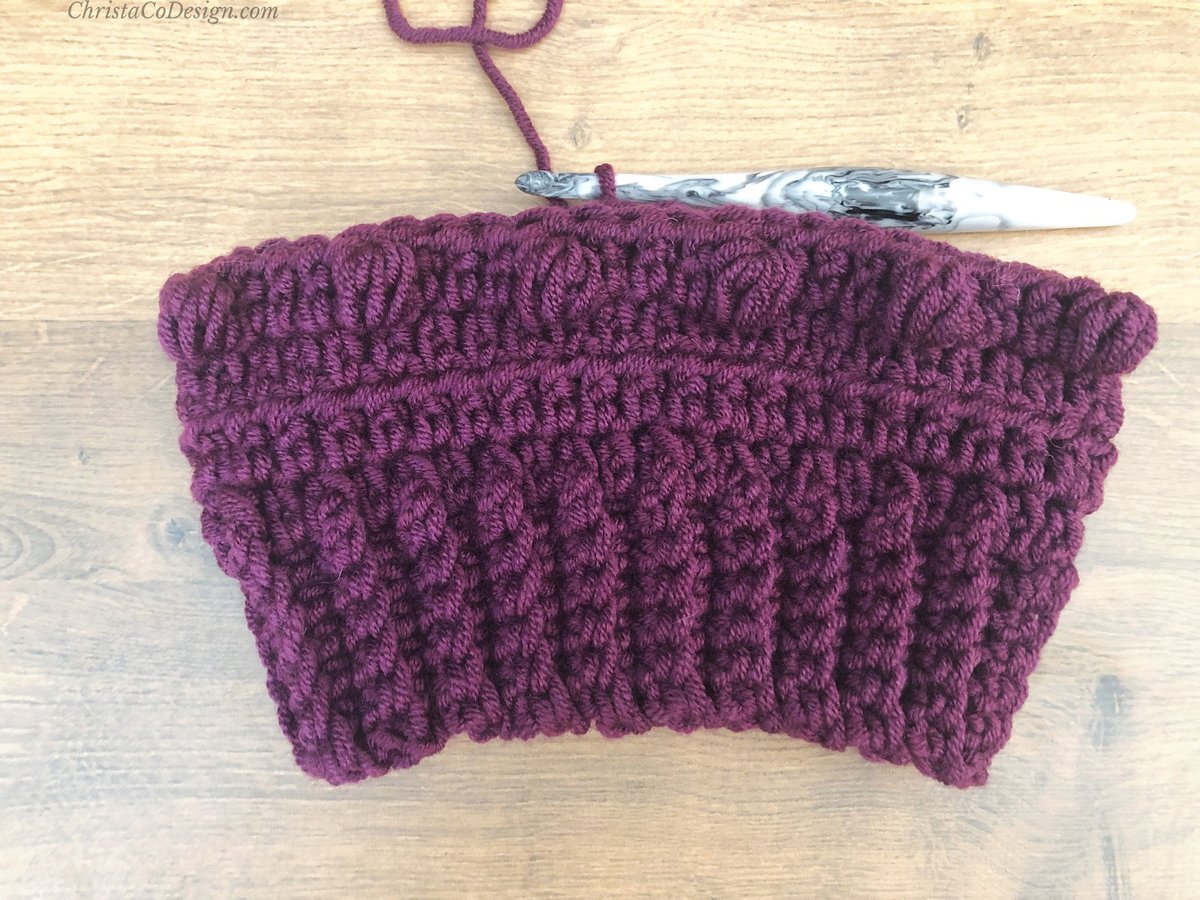 Progress of purple bottom up hat.