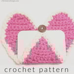 Crochet heart buttoned around gift card.