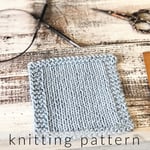 Blue knit square coaster.