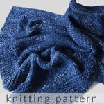 Chunky blue knit blanket.