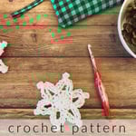 White snowflake and red hook with text crochet pattern.