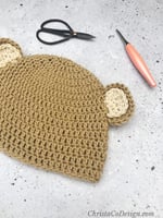 Brown crochet hat with bear ears. 