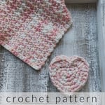 Pink and white crochet washcloth and heart scrubby.