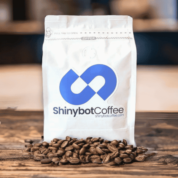 A single bag of coffee with fresh roasted coffee beans around it.
